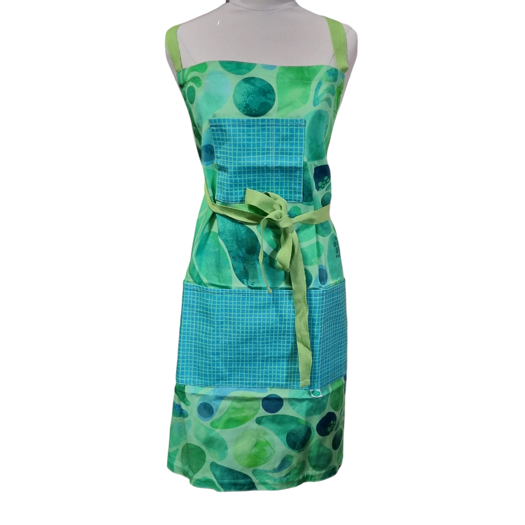 Green printed apron with check patterned pockets